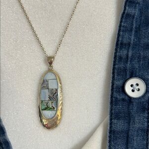 Silpada retired necklace nib has sterling silver with pattern on pendant.